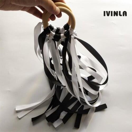 20pcs/lot black and white Wooden Ring Waldorf Ribbon With Bell Hand Kite Toy FLY ME Birthday Party