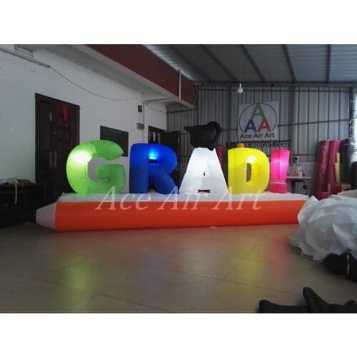 Colorful inflatable decoration for graduations Inflatable Letters"GRAD!" with pencil and Dr. hat