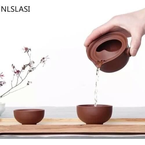 A set of pure hand Tea set tea set pot simple Dahongpao Shih Tzu teapot antique porous purple sand ceramic art tea set