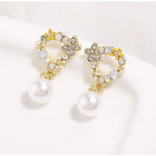 Sweet Girl Earrings 2020 Korean Version Of The New Temperament Earrings Wild Petals Pearl Crystal Small Fresh Flower Earrings