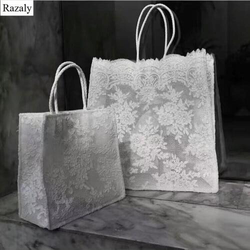 Razaly Women's White Bags