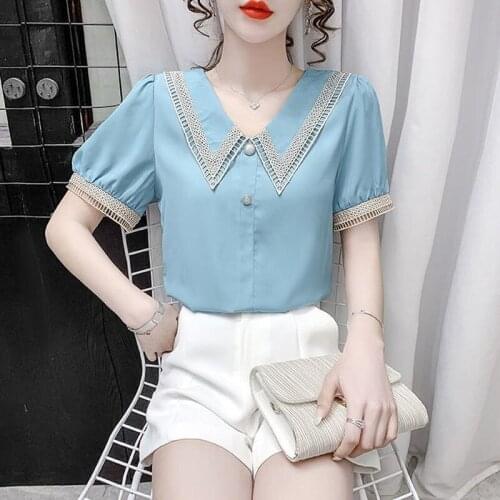 Doll collar shirt female 2021 summer new sweet lace hollow western style stitching short-sleeved design chiffon top