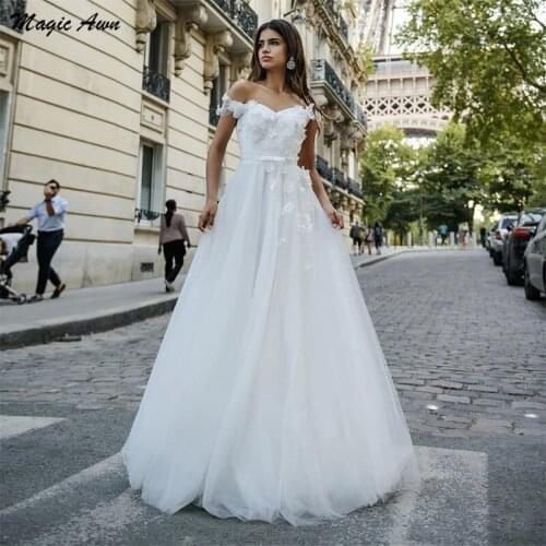 Magic Awn White Tulle Wedding Dresses 2021 Off The Shoulder 3D Flowers Appliques A-Line Beach Bridal Gowns Lace Up Back Mariage