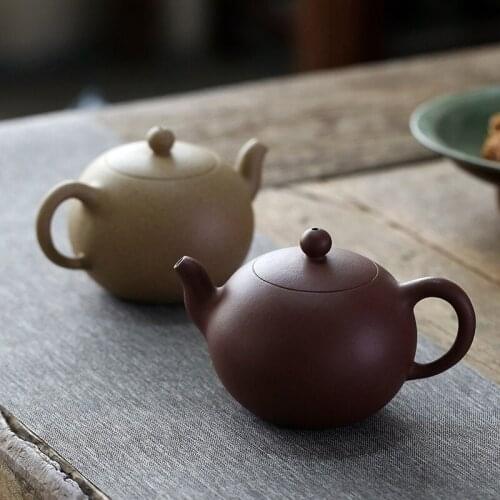 Monohydrate hall of yixing purple clay ore pure manual famous tea pot set period of mud a single bead household 230 ml