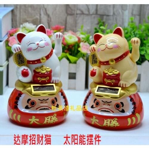 A Prayer Dharma Japan Lucky Cat Solar rocker cat plastic photo can be used in the decoration of the home feng shui store
