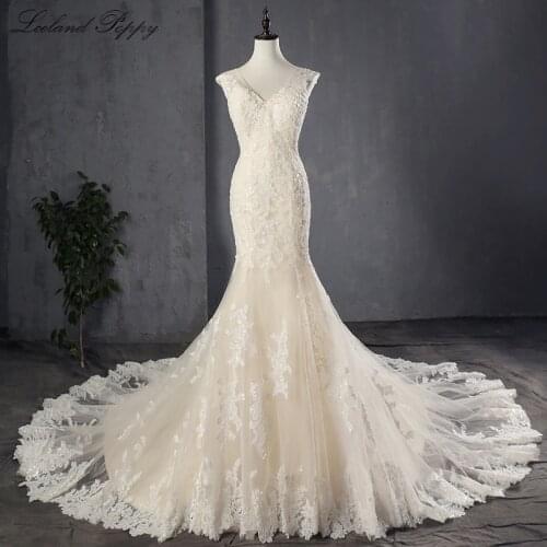 Lceland Poppy Mermaid Wedding Dresses 2020 V-neck Cap Sleeves Lace Appliques Beaded Vestido de novia Bridal Gowns Court Train