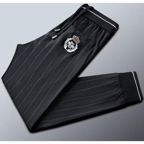 Light luxury quick-drying ice silk fabric casual pants mens close-up and feet high-end small bee striped mens pants