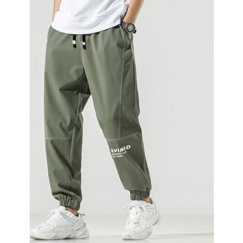 Casual spring tie foot nine minute pants jokers sport small foot pants young popular logo pants male Korean edition trend m-5XL