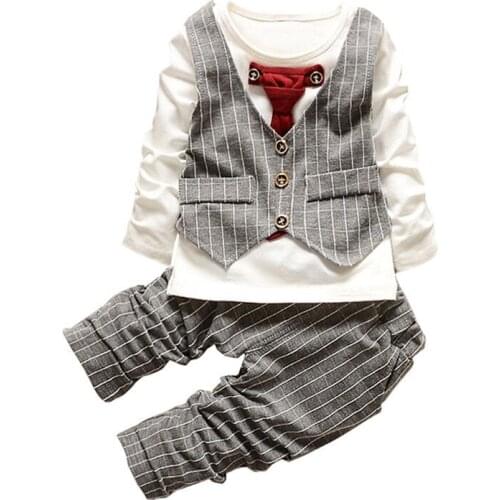 Autumn s children and pants boy off two small suit gentleman tie of a undertakes to suit manufacturer