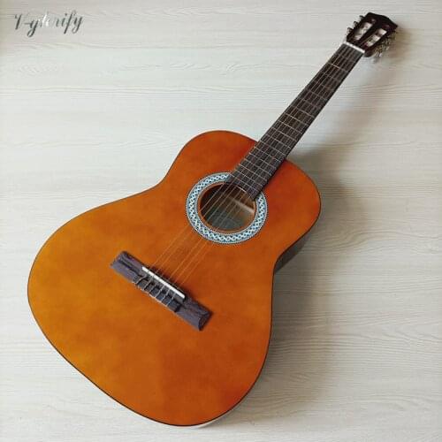 Stock 36 inch spruce wood top classic guitar natural color 6 string high gloss finish mini classical guitar with small flaw