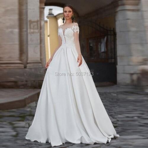 Vestidos De Noiva Long Sleeves Scoop A Line Wedding Dresses Lace Button Illusion Wedding Bridal Gown Court Train Custom Made
