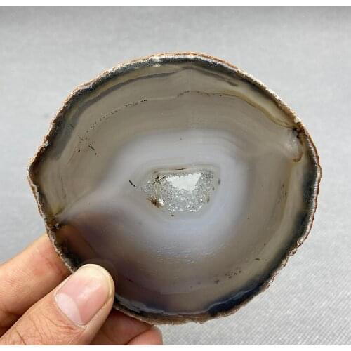 Natural agate slice polished ore specimen with crystal hole