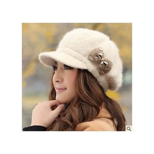 Free shipping Winter hats Ms. Rabbit fur cap in the winter Lovely bowknot fashion knitting wool cap