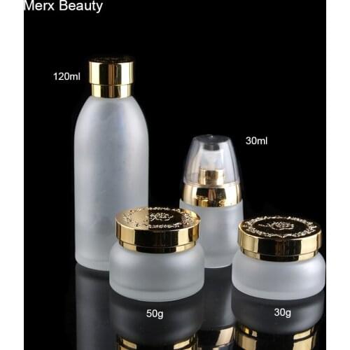 30ml 1floz Frosted Clear Glass Lotion Cosmetic Toner Serum Bottle Gold Silver Flower Lid - 50pcs/Lot, Merx Beauty Brand