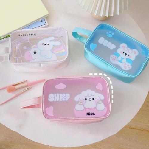 Cute and convenient travel cosmetic bag zipper design PVC large capacity handle cartoon cosmetic bag for daily home outing use