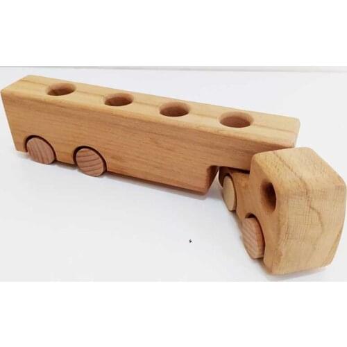 WOODEN TRUCK DRIVING TOY IS COMPLETELY HANDCRAFTED AND HARMLESS HEALTHY FOR YOUR CHILD