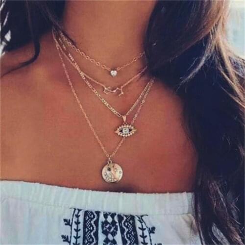 European and American cross-border new temperament inlaid rhinestone sweater chain creative retro eyes moon pendant multi-layer