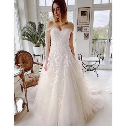 New Romantic Wedding Dresses Off Shoulder Lace Appliques A Line Bridal Gowns Sweep Train Custom Made Tulle Wedding Dress
