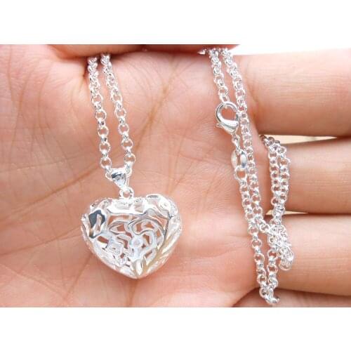The new listing hot selling retro palace ornaments 925 silver carved pendant necklace wholesale