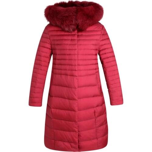 Womans A coat under a white duck in winter plus its size wter