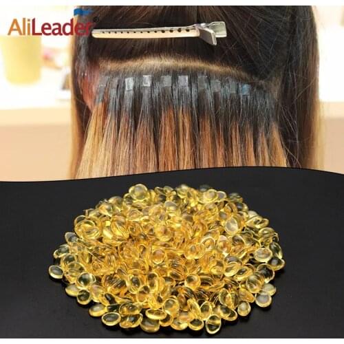 Alileader Good Quality Itlian Keratin Glue Grain Transparent Yellow Color Keratin Glue Bead For I Tip/U-Tip Extension Human Hair