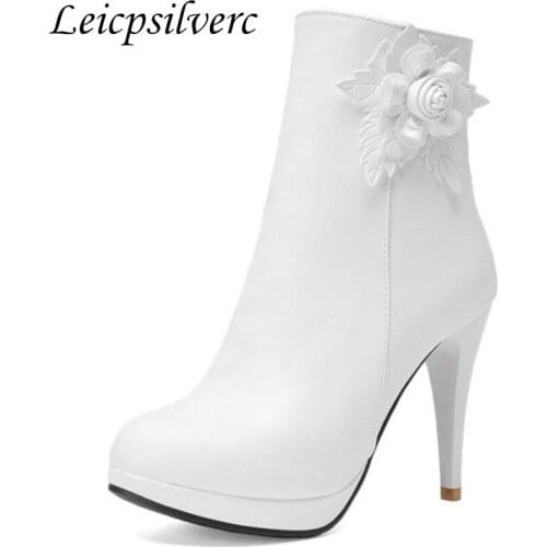 New flower waterproofing metal decorative flower round head fine heel Martin boots side zipper single boots