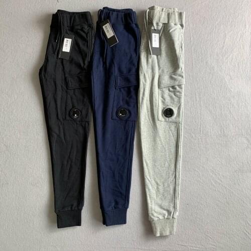 High Quality Solid Color Loose Men Sweatpants Classic Pocket Lenses Decorated Elastic Waist Trousers Women Casual Pants