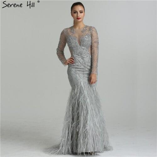 2020 Dubai Designer CUT-OUT Sexy Evening Dresses Long Sleeves Diamond Feathers Mermaid Tulle Evening Gowns LA6407