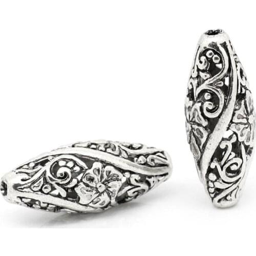 DoreenBeads Zinc metal alloy Spacer Beads Oval silver color Flower Hollow Pattern About 26mmx11mm,Hole:Approx 1.9mm,1 Piece
