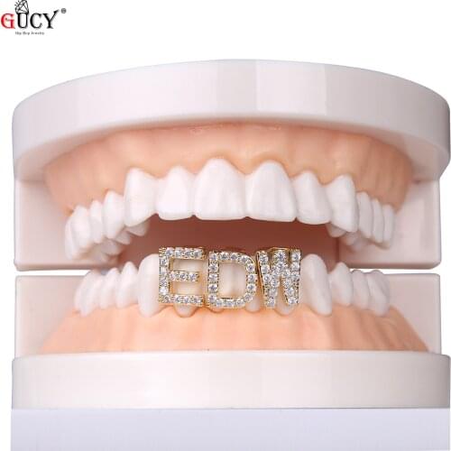 GUCY New Hip Hop 26 Letters Teeth Grillz All Iced Out Micro Pave CZ Grills With Silicone For Christmas Gift