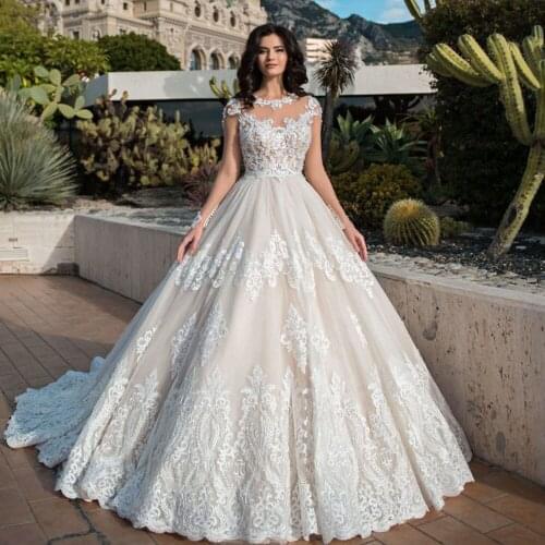 Beading Sequined Appliques Princess Ball Gown Wedding Dresses Long Sleeve Robe Mariee O-neck Buttons Up Bridal Dress China