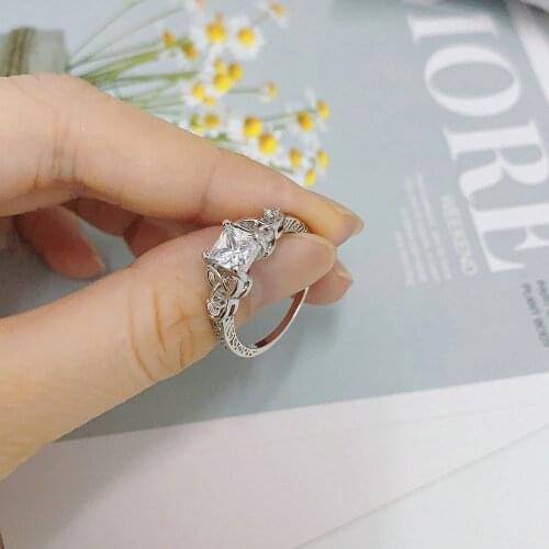 ZHOUYANG Wedding Engagement Rings For Women Delicate Hollow 4 Claws Zircon White Gold Color Party Gifts Fashion Jewelry DZR022