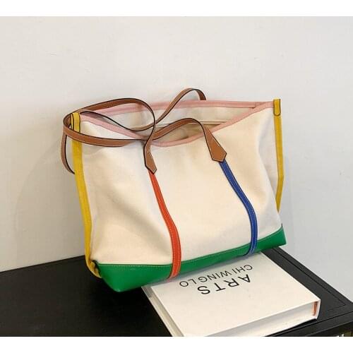 Korean version of large-capacity canvas bag womens new fashion all-match shoulder bag commuter portable tote bag