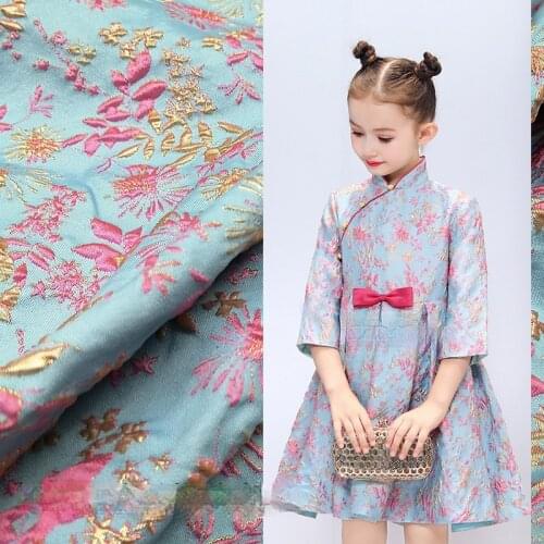 High-end gold jacquard childrens cheongsam fabric dress windbreaker Tang suit brocade clothing fabric handmade diy