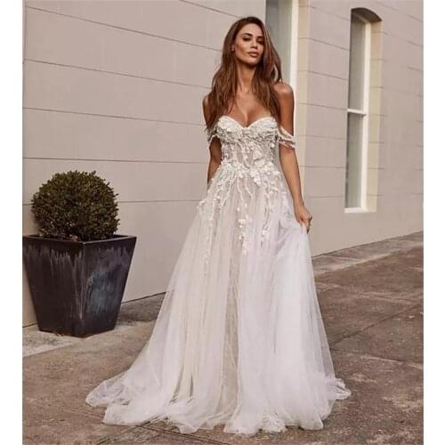 Beach Wedding Dresses Boho 2020 Off the Shoulder Lace Appliques A Line Bride Dress Sleeveless Open Back Princess Wedding Gowns
