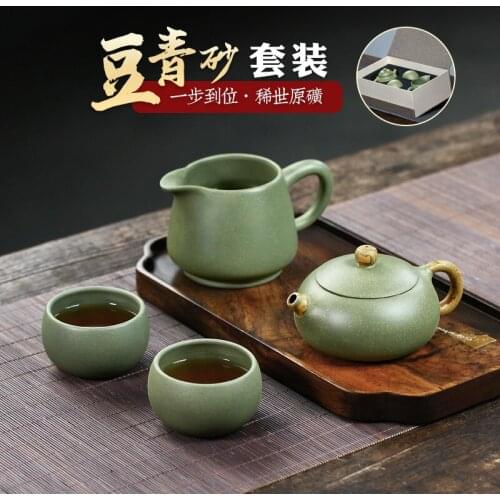 Two 】 yixing recommended pure manual teapot household Pan Ye pea green sand ground mud flat xi shi 210 cc