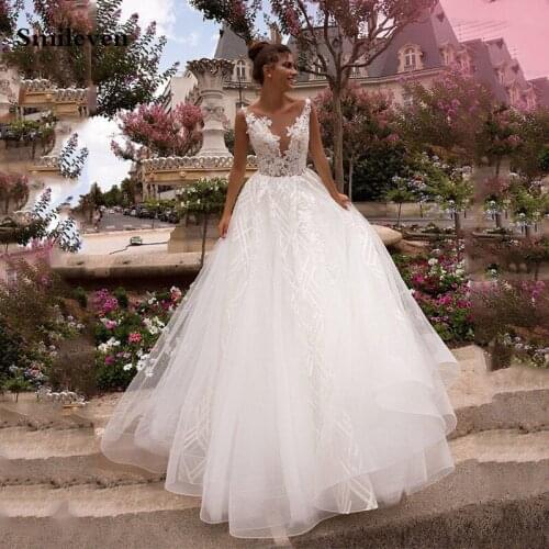 Sexy Ivory Bohemian Wedding Dress Ball Gowns Appliqued Lace Bridal Gowns Backless Vestido De Noiva Lorie Wedding Gowns