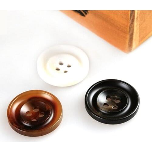 15-34mm Spot wholesale resin imitation horns bilateral stick flower buttons high-end suit fine-edged matte spray paint buttons