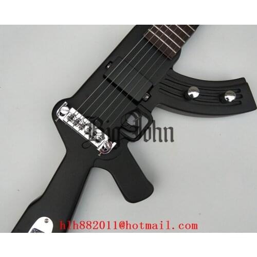 AK shape dumb black fine electric guitar chrome hardware