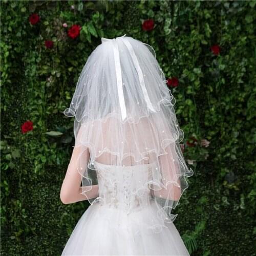 Luxury Four Layer Short Pearls Beaded Bridal Wedding Veil Elbow Length Bridal Veil With Comb Puffy Spring Bride Veil With Bow