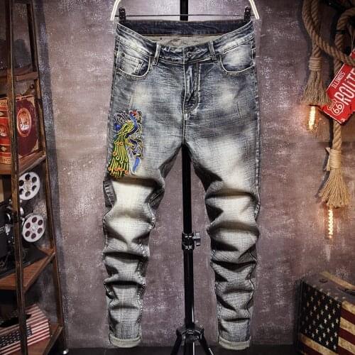2021 spring new mens jeans Chinese style animal embroidery peacock denim trousers retro slim wash mens jeans 28-38