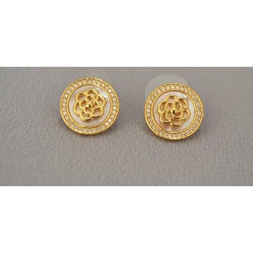 South Korea Dongdaemun brass micro-inlaid zircon flash camellia simple temperament 925 silver needle stud earrings