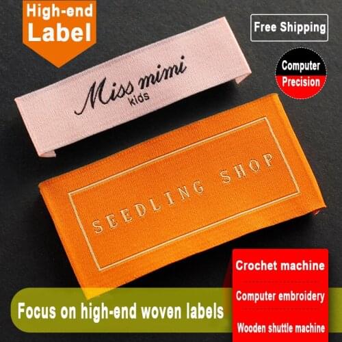 HighQualityCustomClothingLabelsBrandCrochetMachineWhiteFocusOnHigh-endWovenLabelsPersonalizedSatinCareLabelForWomensDress