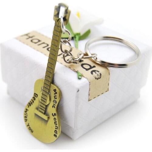 New Fashion Unique Guitar Alloy Keychains Purse Bag Buckle HandBag Pendant For Car Keyrings Women Key Chains Original Gift