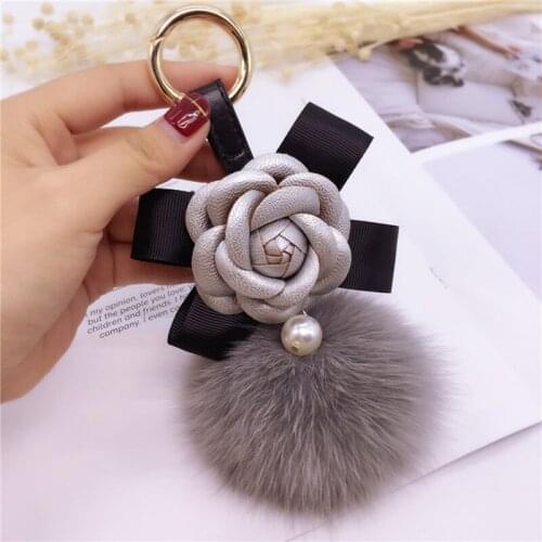 New creative Camellia bow keychain ladies fox fur ball key ring fashion ornaments bag pendant