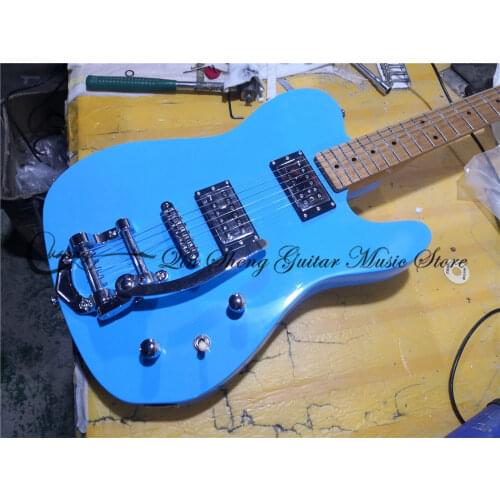 Free shipping custom 6 string guitar,blue basswood body,tremolo bridge,HH pickups,chrome buttons