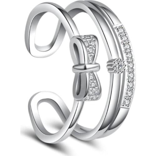 Korean version of the female fashion sweet two-color double-layer bow opening silver plated rings SA063