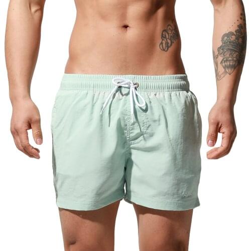 Men Beach Shorts Solid Swimsuit Casual Swimming Trunks with Tether Elastic Loose Swimwear Quick Drying Summer Bathing Pants
