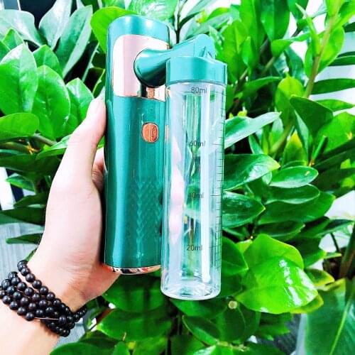 Portable water replenishing oxygen injecting apparatus with hand held Nano spray bubble body skin rejuvenation instrument