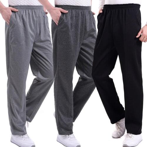 Men Solid Color Pocket Loose Harem Pants Running Sports Sweatpants Trousers Men Loose Pants Running Sports Trousers Streetwear